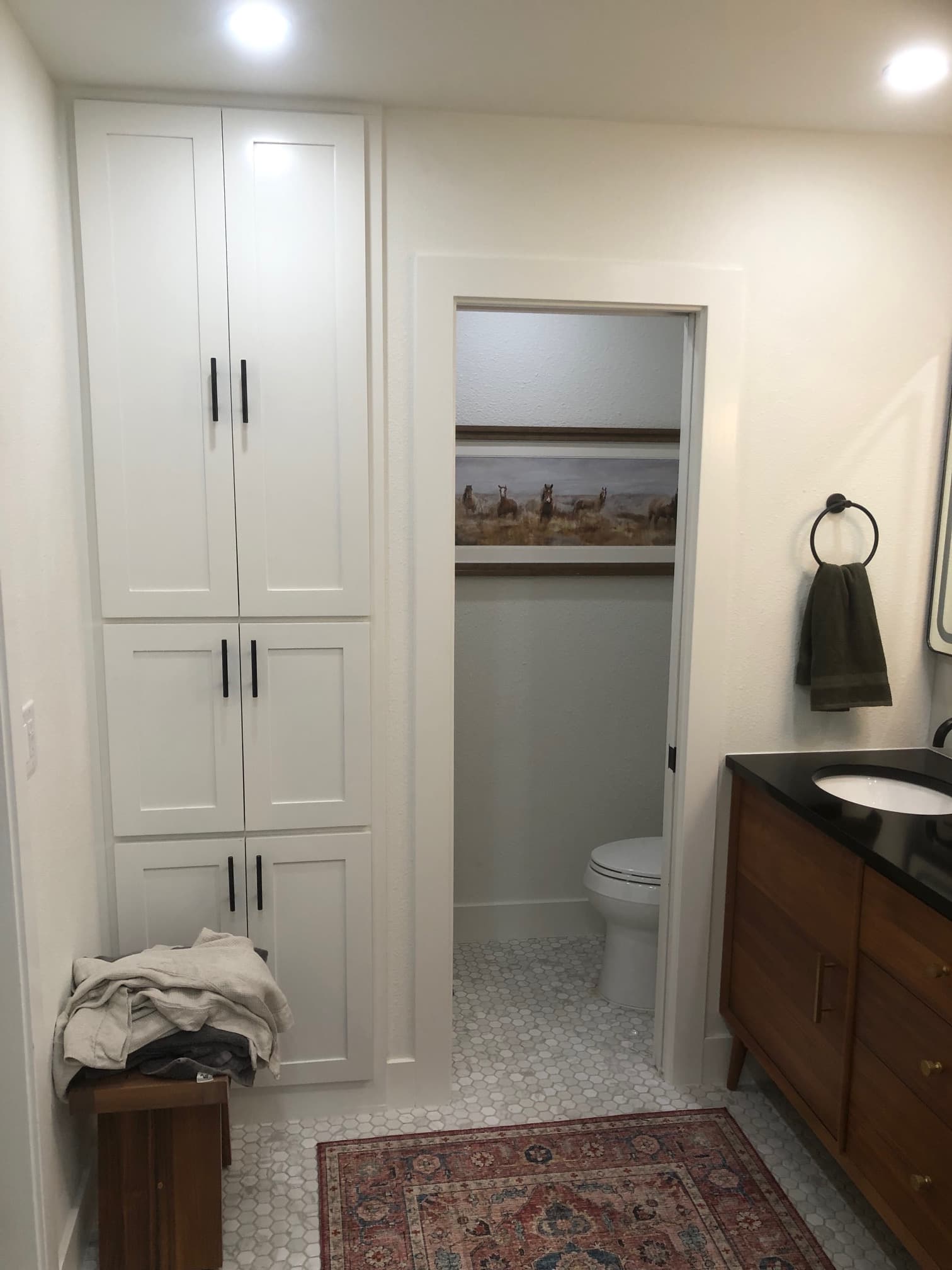 Professional bathroom remodel project featuring modern bathroom white linen hex tile