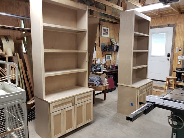 Custom built-in bookcases under construction in the DH Construction San Antonio shop