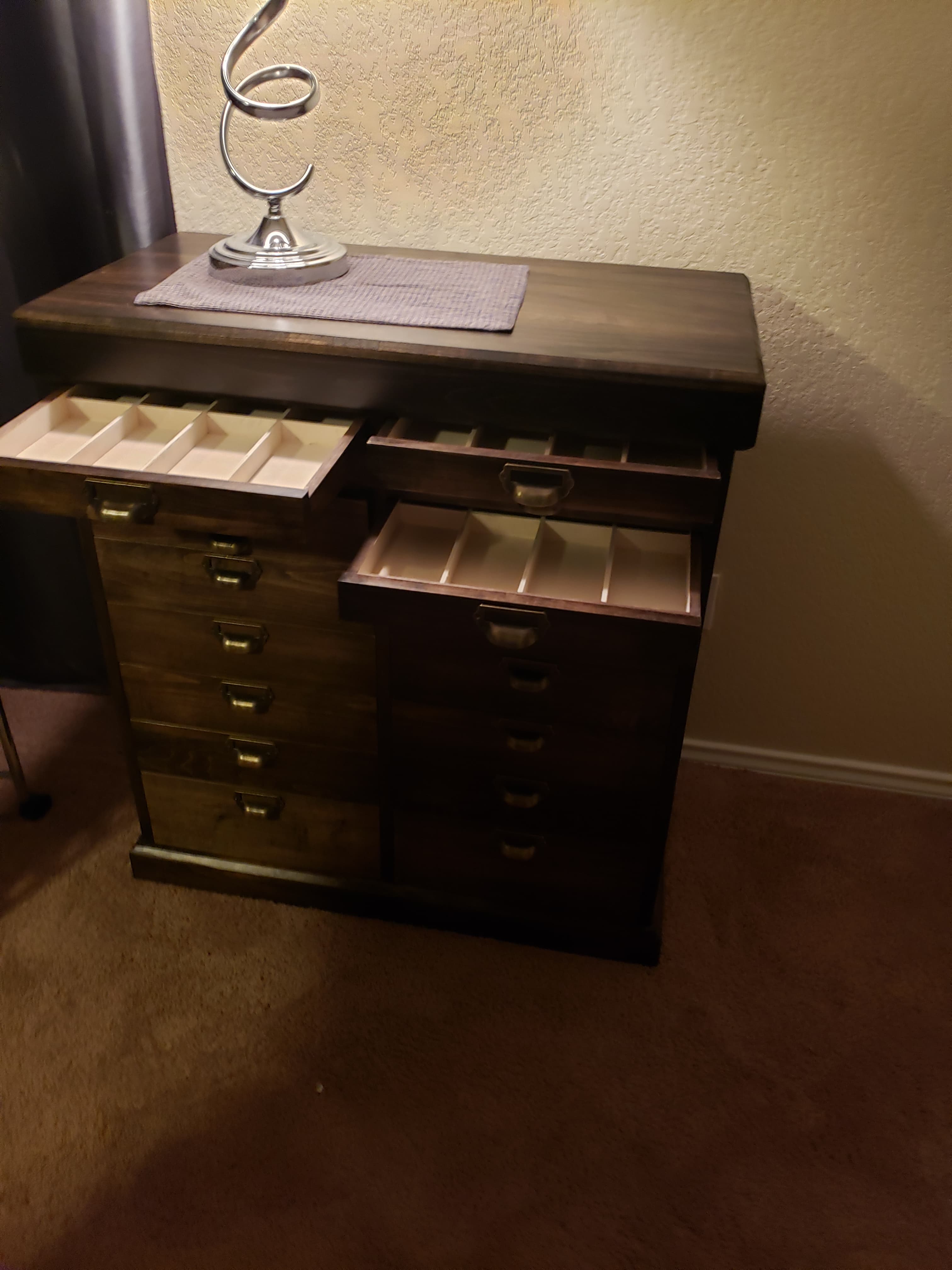 Custom liquor cabinet in dark wood with interior lighting - San Antonio TX