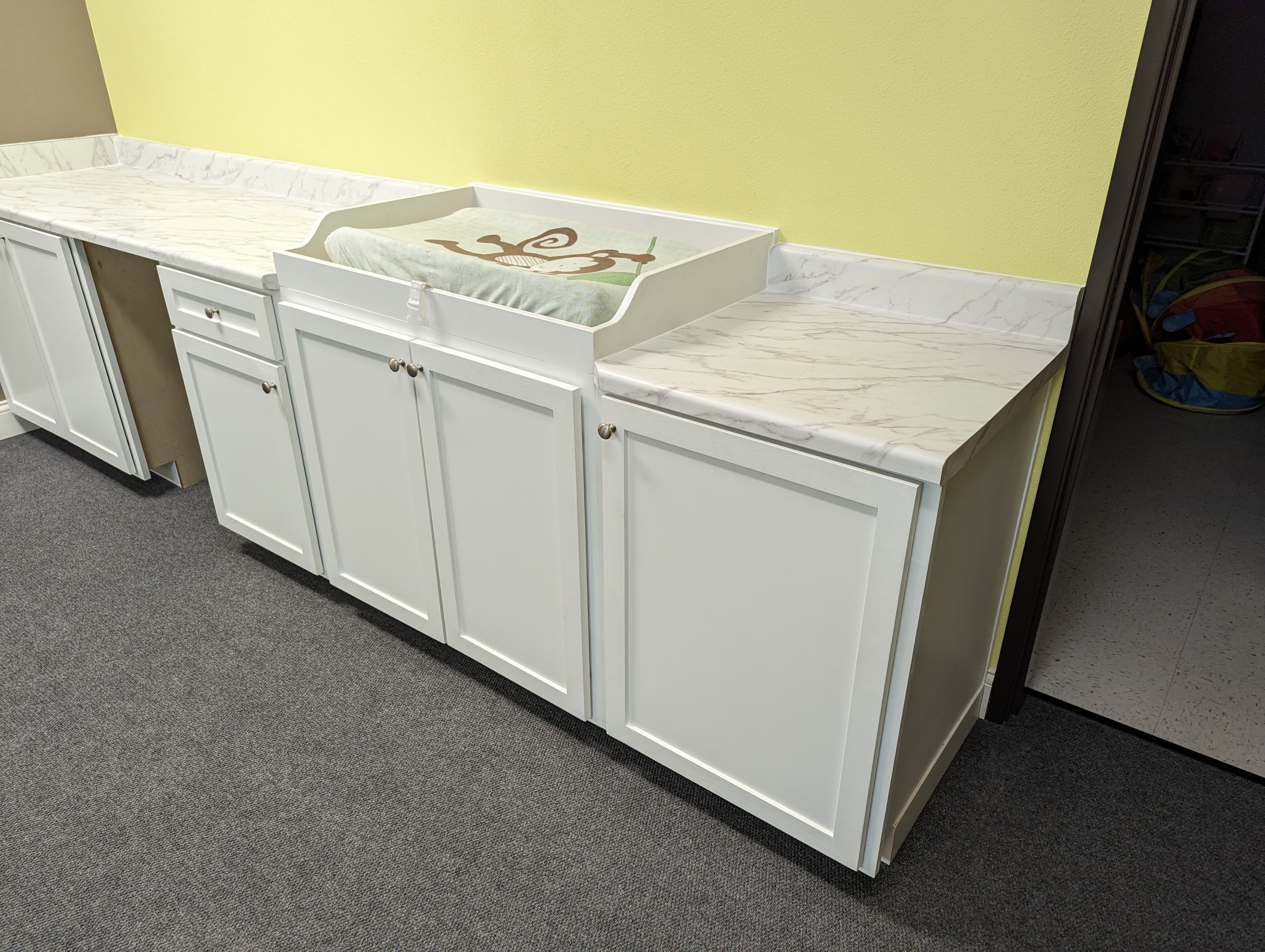 Custom mudroom bench with storage and coat hooks - San Antonio TX