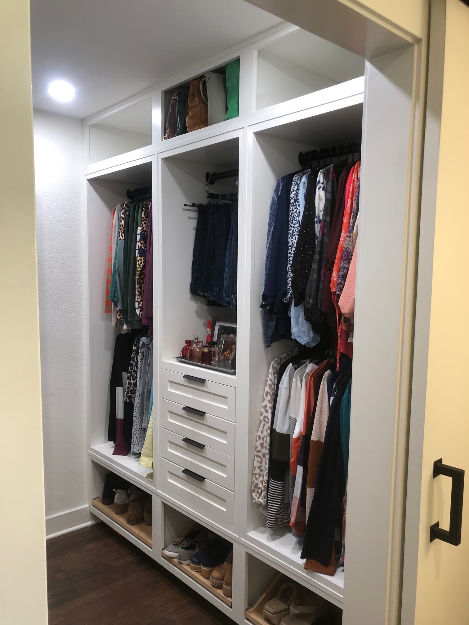 Custom walk-in closet cabinets with organized storage - San Antonio TX