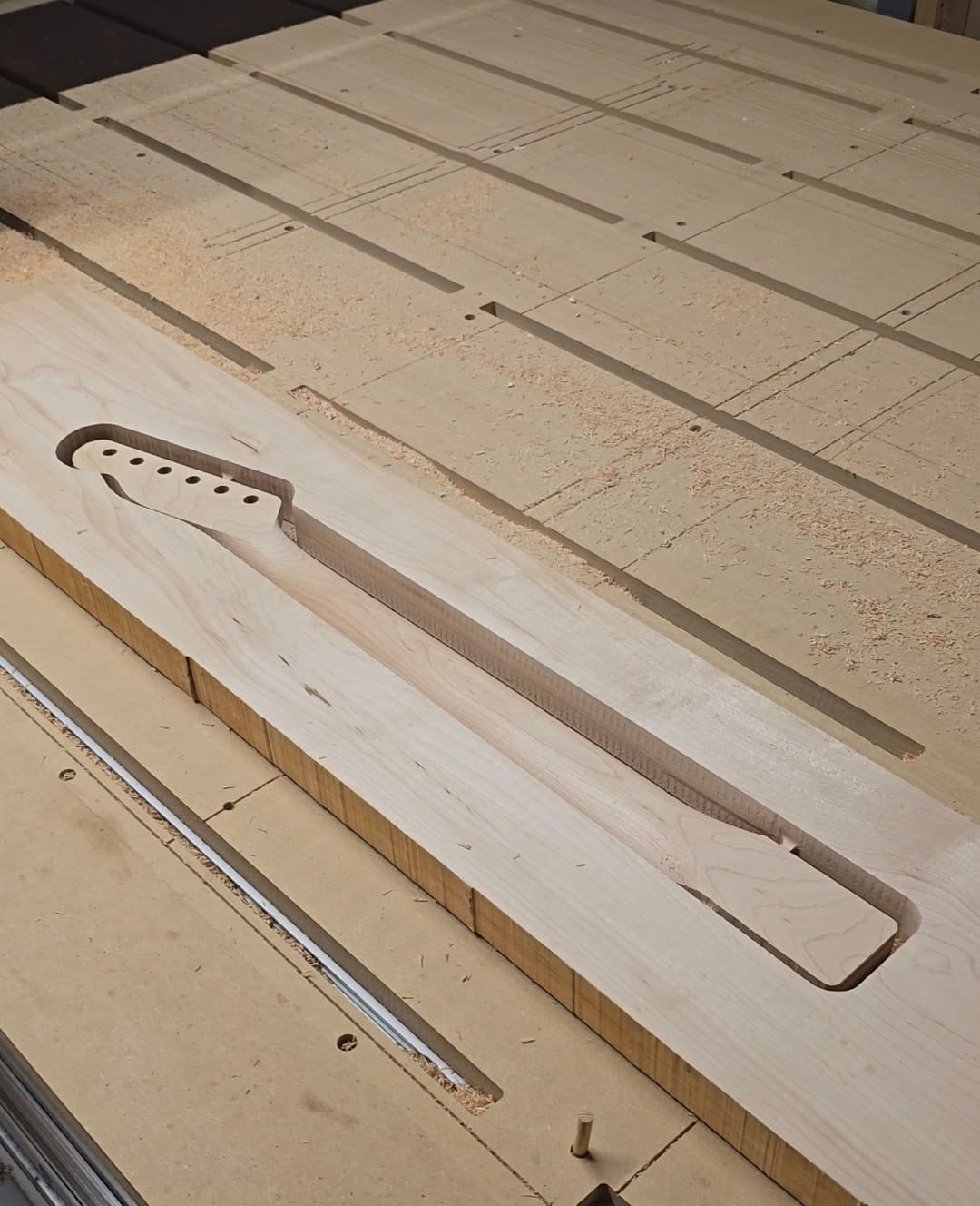 Custom CNC guitar neck made from maple wood - San Antonio carpentry