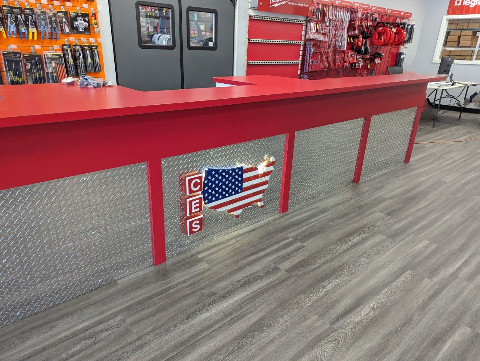 Custom commercial store counter with red diamond plate - San Antonio carpentry
