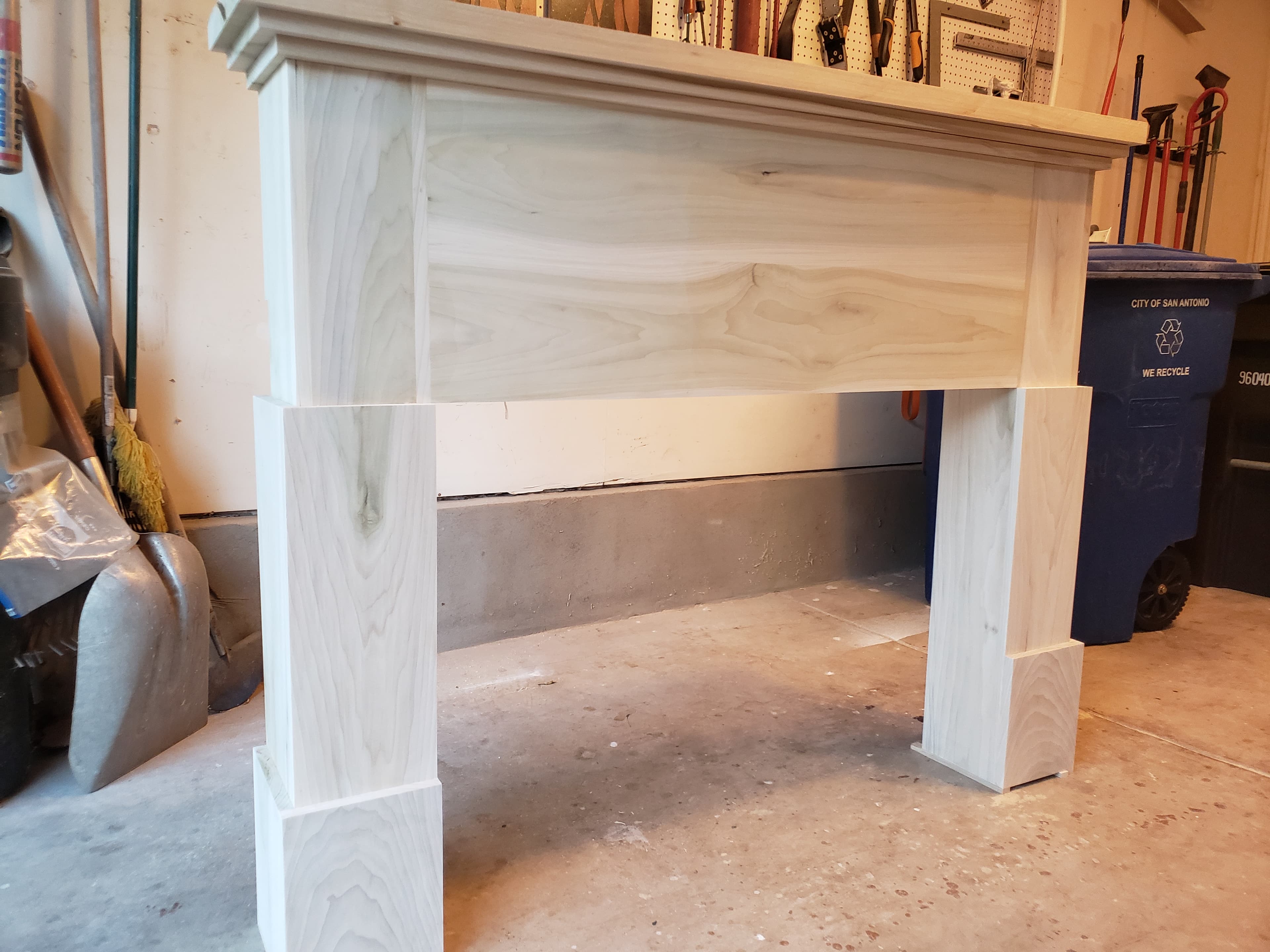 Custom fireplace mantel construction in our workshop - San Antonio carpentry