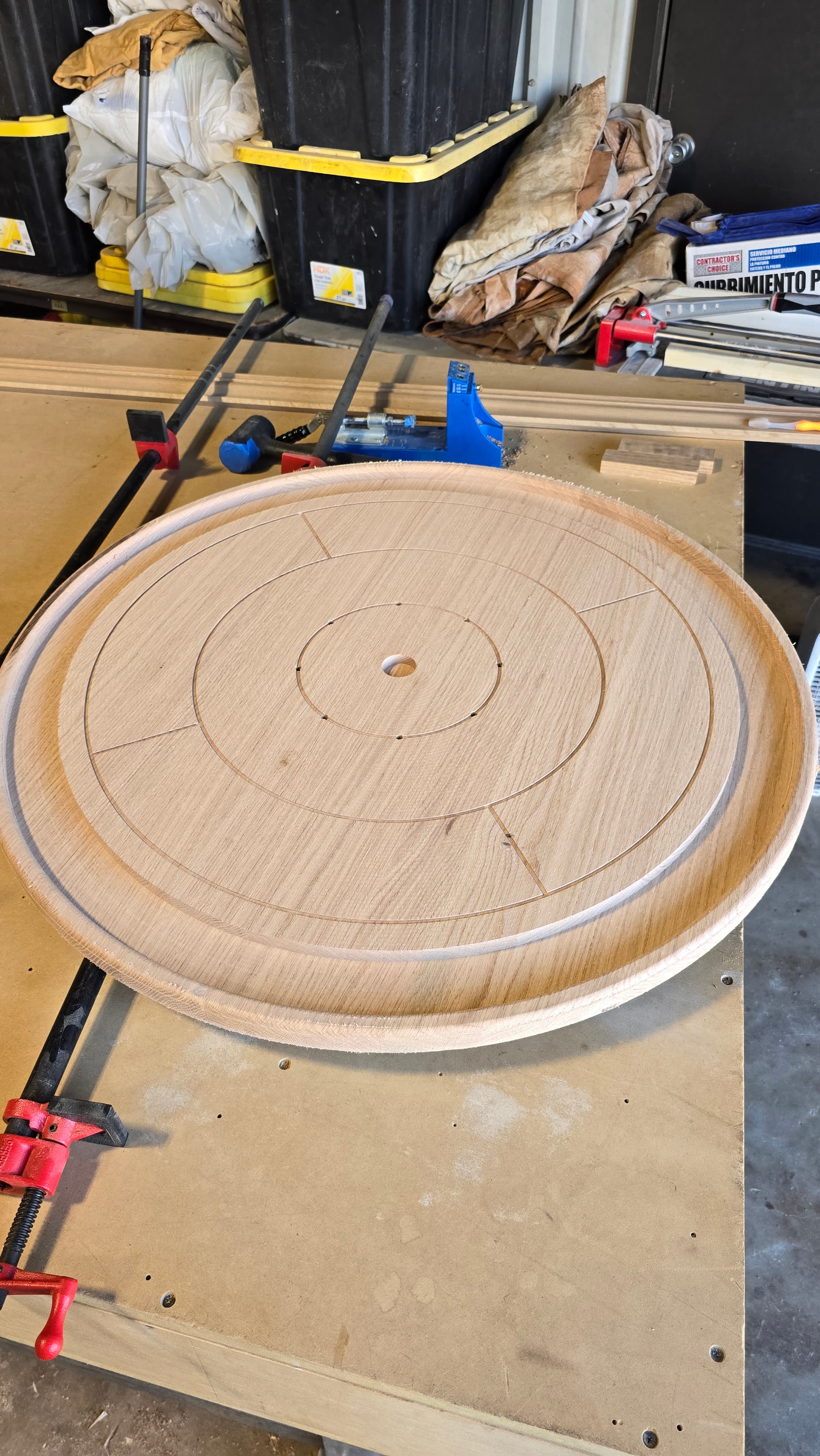 Custom round wood table top construction with clamps - San Antonio carpentry