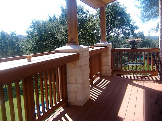 Professional outdoor living project featuring deck stone columns