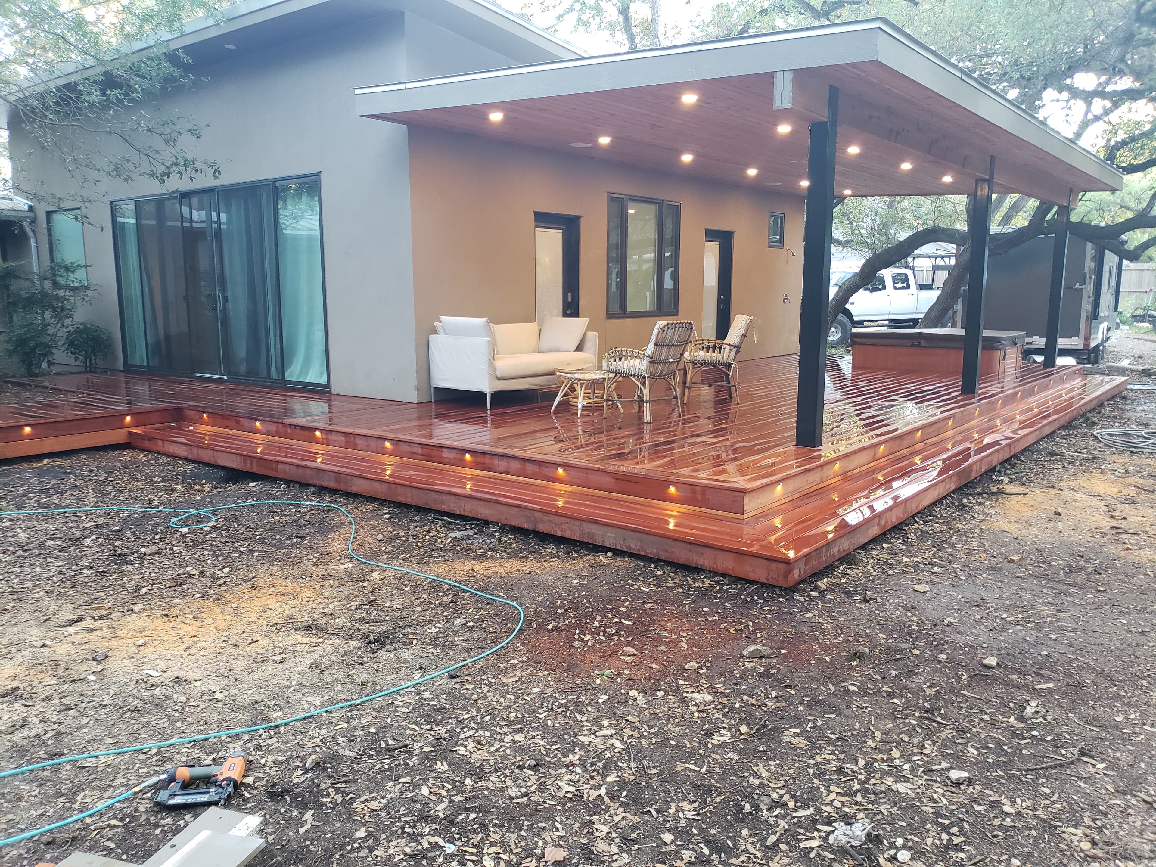 Tigerwood hardwood deck with recessed deck lighting