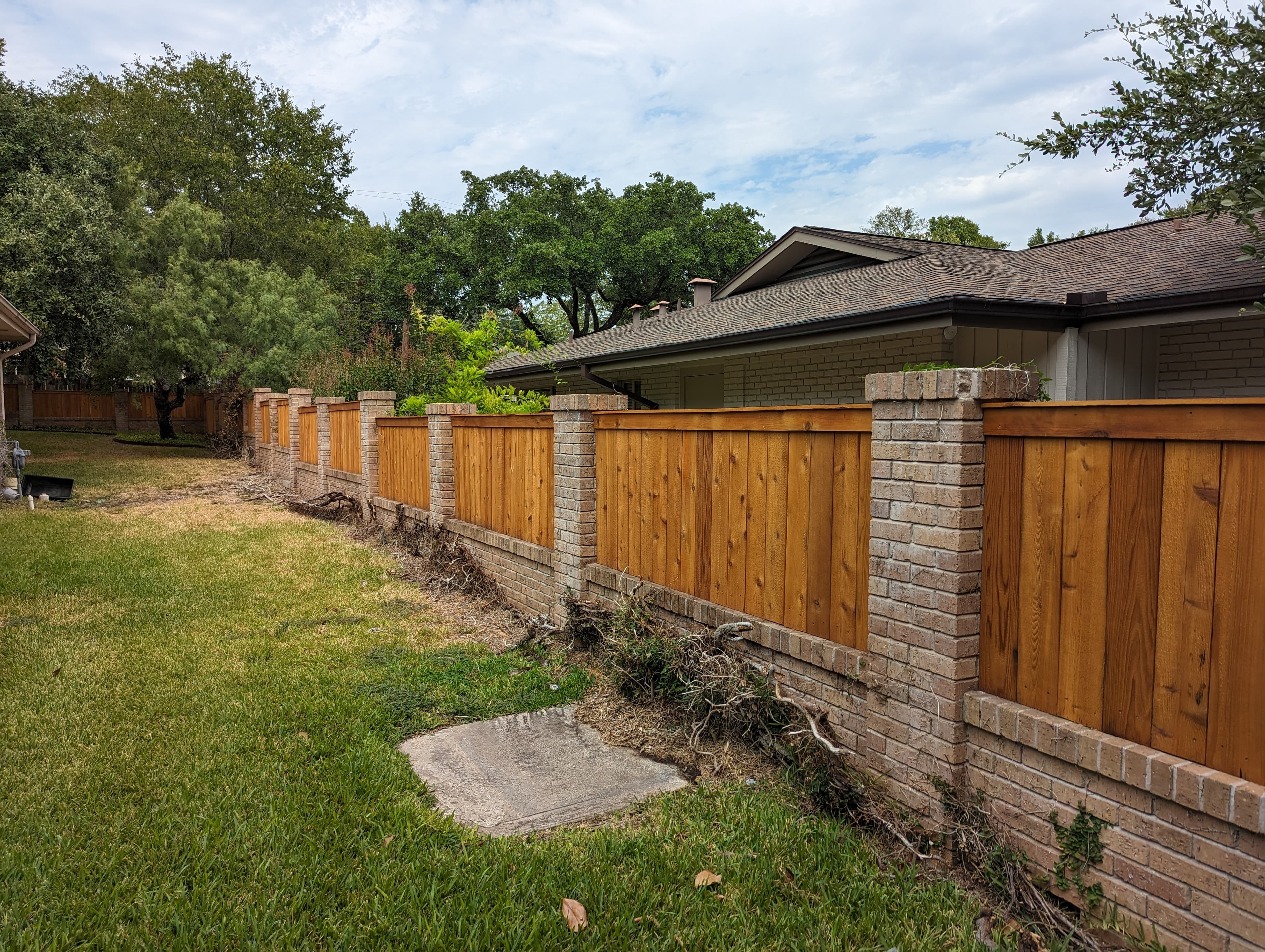 Cedar Privacy Fence with Stone Columns