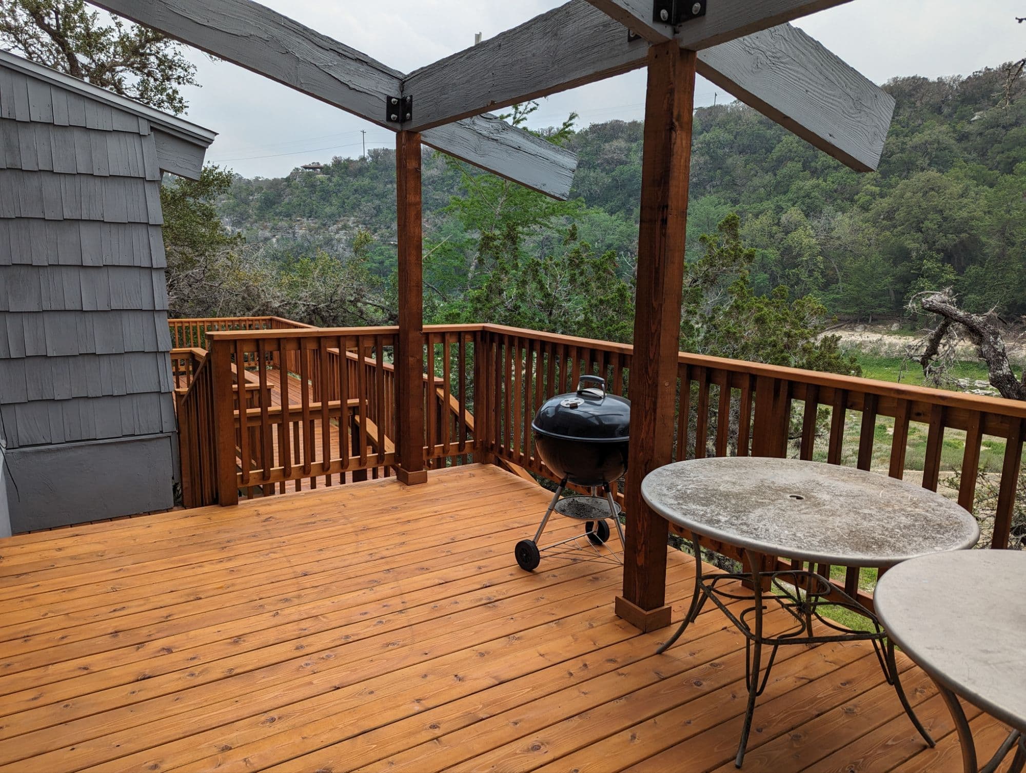Beautiful cedar deck with steel pergola and hill country view