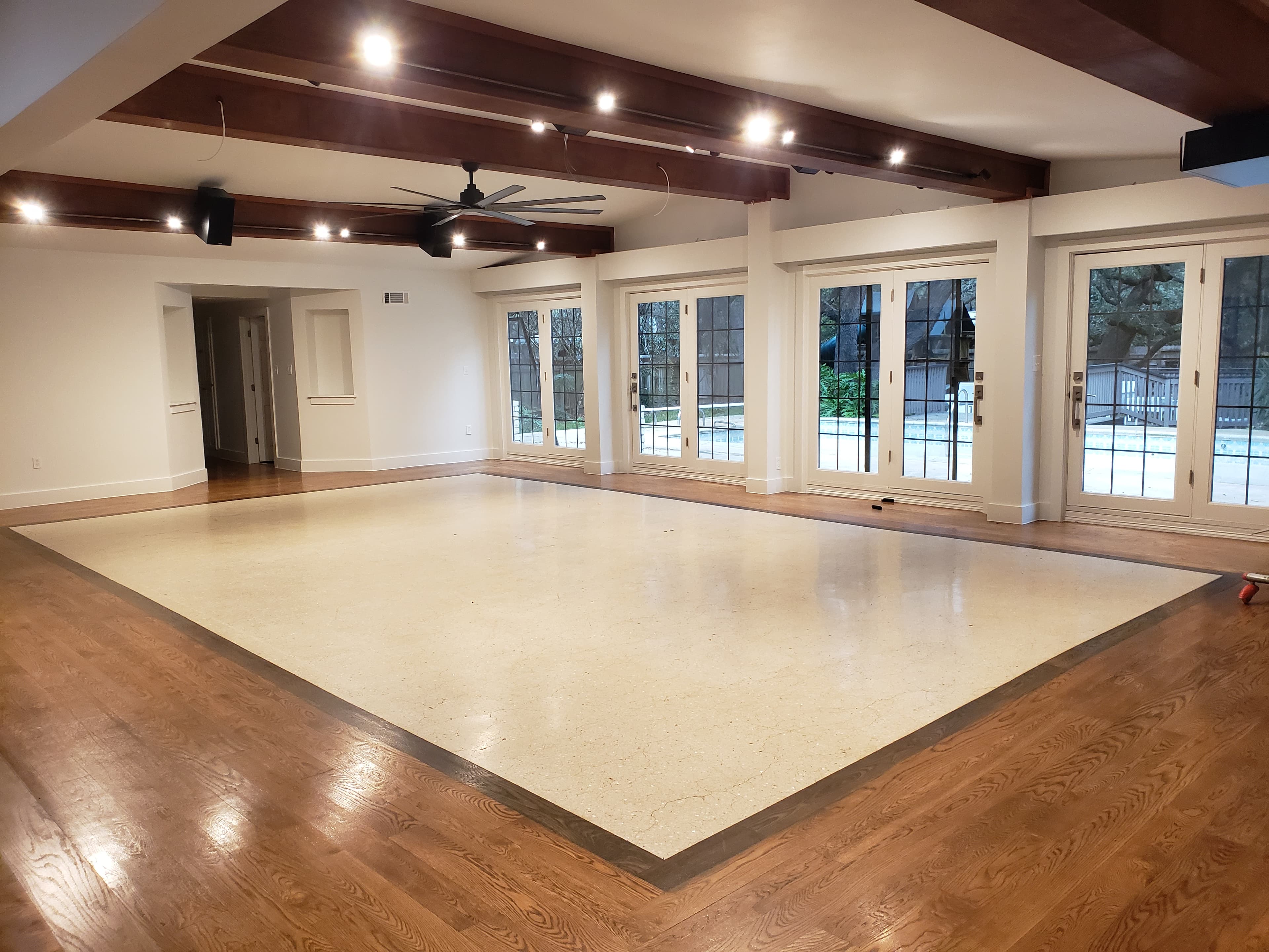 Complete whole home renovation with exposed beams and French doors in San Antonio